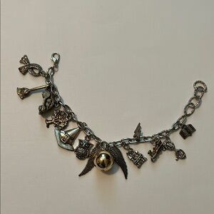 Harry Potter style charm bracelet, silver tone, not officially licensed